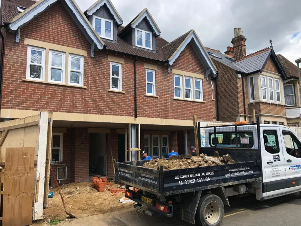 Two-storey extension under construction with scaffolding at an Oxford property